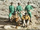 Norton (left) and a fellow climber with three porters (back row: left to right: Llakpa Chedi, Semchumbo, Narbu Yishe), 1924 Mount Everest Expedition (Photo: John B. Noel; Courtesy of RGS-IBG)