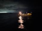 Land ho! After weeks of seeing nothing but open ocean, the island of Antigua appears in the darkness