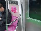 Pink seating reserved for pregnant women, handicapped people or for babies