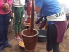 My friend Angel is helping our host families by grinding peanuts for a popular Mozambican dish called matapa