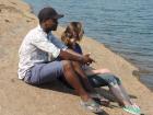 My friend David and I sit for a while and take in the beauty of the Chicamba River before we begin fishing