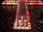 A cross made of candles to remember those who died