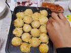 This is takoyaki, little cake balls with chopped octopus, but Reren made a vegetarian version, too