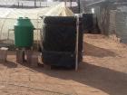 The black container is a fish farm at the school for children with disabilities. 