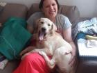 Holding Alice, one of my landlord's silly Labrador puppies! 