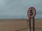 Sand dunes from the Namib Desert stretch to the Atlantic Ocean