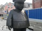 This statue of a policeman represents the guards that used to patrol the marketplace
