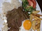 This meal in Quito consisted of rice, steak, fried egg, French fries and salad all for $5.00