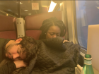 My friends Alex and Tolu felt sleepy on the train 