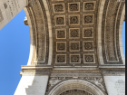 Looking up from under L'arc de Triomphe