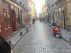 A view of a traditional street in Bastille, a neighborhood nearby 