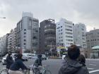 Bike riders in downtown Osaka