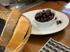 While we were waiting for our food, we were served bread and olives; olives are very popular here because of the abundance of olive plants and olive oil