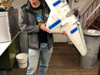 John Cassano displaying a freshly assembled DataHawk drone