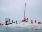 Setting up the tower with multiple instruments to measure atmospheric parameter (Photo: Lianna Nixon)