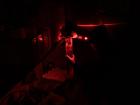 Eco scientist Elisa Droste melts ice samples in a lab located in the Polarstern’s “Red Light District,” where only red light is allowed so it does not harm the organic material that is in the ice