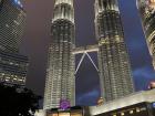 Petronas Twin Towers with fountain show at night