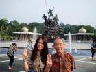 Nara with her grandfather in Malaysia