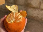 A clementine from a produce stand