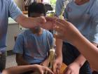 Some of my sixth graders completing the Marshmallow Challenge!
