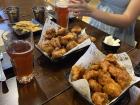 Sharing food is very common! This is just a basic proportion of two different chicken wings. The sizes are large enough to share. 