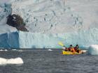 Laurette and Anzac kayaking in Antarctica