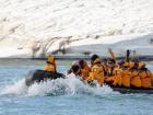 The Inspiring Explorers team on a zodiac boat