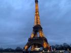 The Eiffel Tower, if you look closely, you can see the Seine is overflowing from the rain!