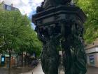 Public drinking fountain, you place your bottle of water in the middle and water comes out of the top of the sculpture