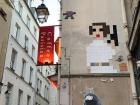 This street art is by a French artist named Invader. His art is very popular and nearly everywhere. It's inspired by the Space Invaders video game. I have seen his work in streets all over the world even San Diego! This is Princess Leia in pixel mode!