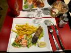 Salmon and fries, as you will see most restaurant meals are served with fries!