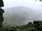 The crater of this volcano is a lagoon that sits above the clouds