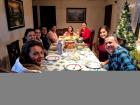 Enjoying a Thanksgiving feast with mi familia tica