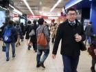Average foot traffic inside of Shinjuku Station, with shop entrances in the back