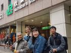 Me posing with friends in front of the entrance to Akihabara Station