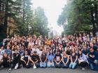 Posing (in the center wearing a bright pink shirt) with all the international students at the scavenger hunt for W-mentor Program