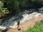 Hiking by a waterfall