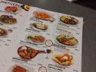 The Denny's menu looks a little different here (shrimp, hot wings, steak?!)