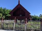 An example of a Māori building with traditional carvings