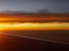 View of sunset over the Bay of Bengal from my airplane