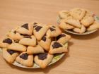 These are "hamantaschen", pastries eaten during "Purim"