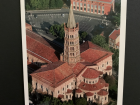 The postcard better shows how this church is built in the shape of a giant cross