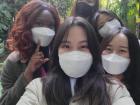 Taking selfies with friends at the park is a MUST