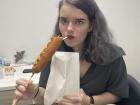 My good friend modeling my favorite cheesy corndogs