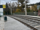 I take the tram from the stop near my house, which is the tan building in the background