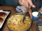 This is a Pastelón that I made for a potluck! It's sort of like a sweet plantain lasagna, with layers of meat and cheese