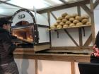Oven used to bake fresh bread bowls at the market