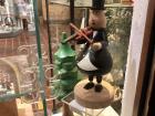 A cute little wooden violinist on display in Bremen's historic Schnoor quarter
