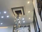 Chandelier made of recycled pieces of plastic and glass