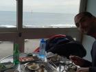 Me enjoying the food and the view. Notice all the side dishes!